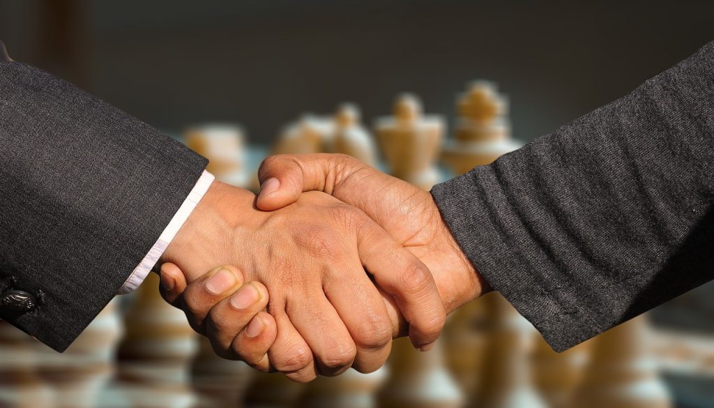 handshake agreement hands chess 7239620